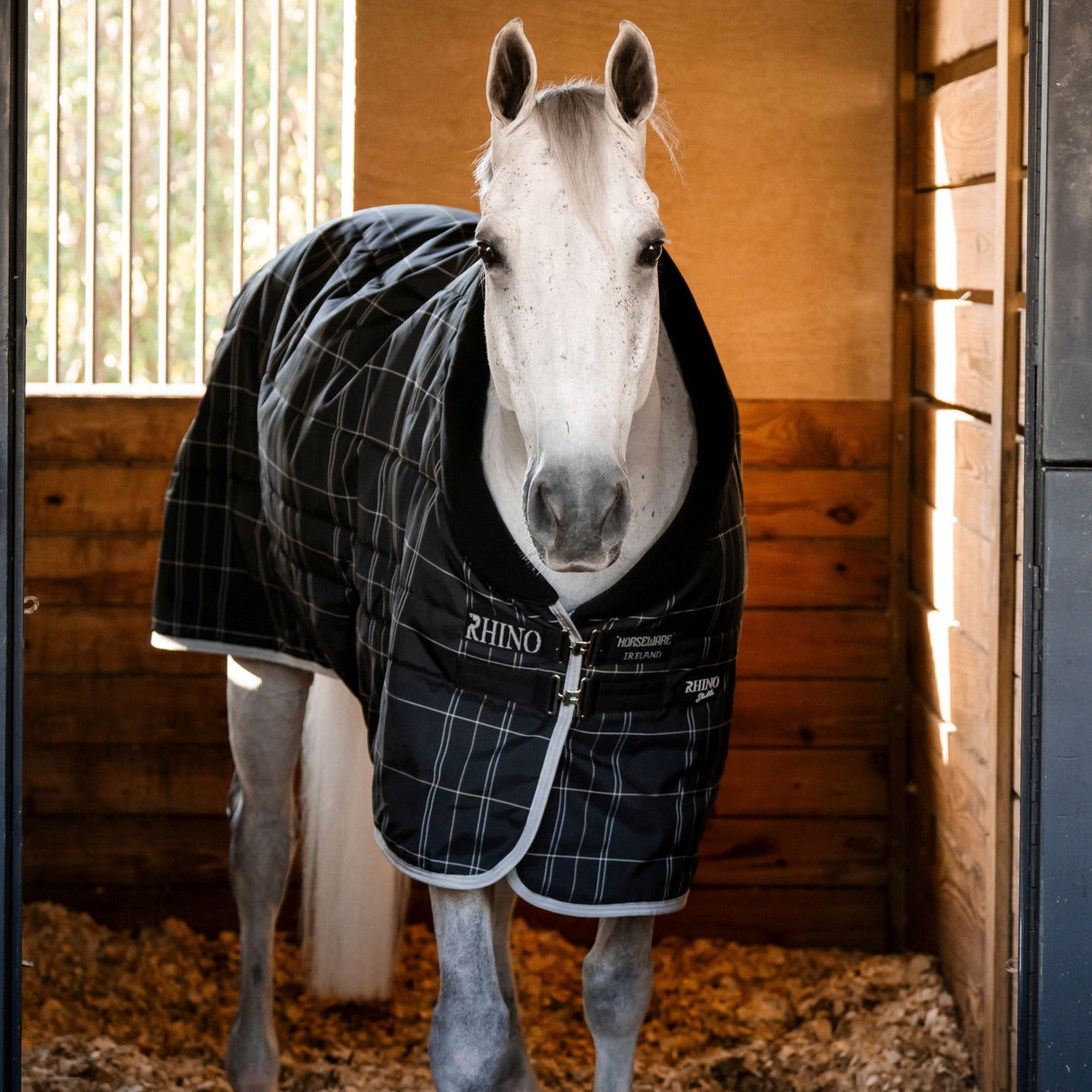 Horseware Ireland Rhino 100g Stable Rug #colour_black-grey-white-check-grey